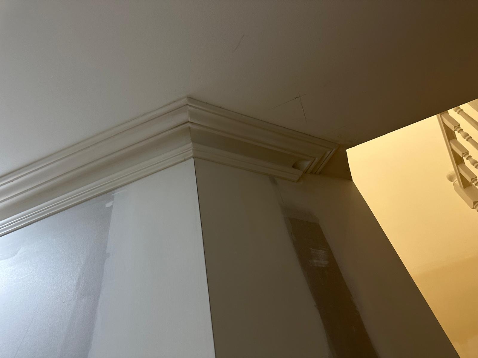 Detailed crown molding corner installation and finishing
